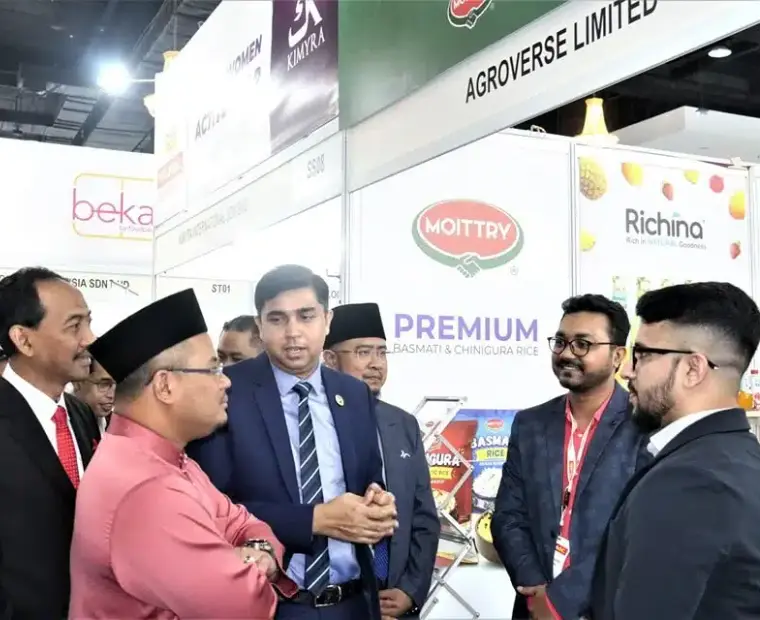 Agroverse leadership greeting guests at an international food fair